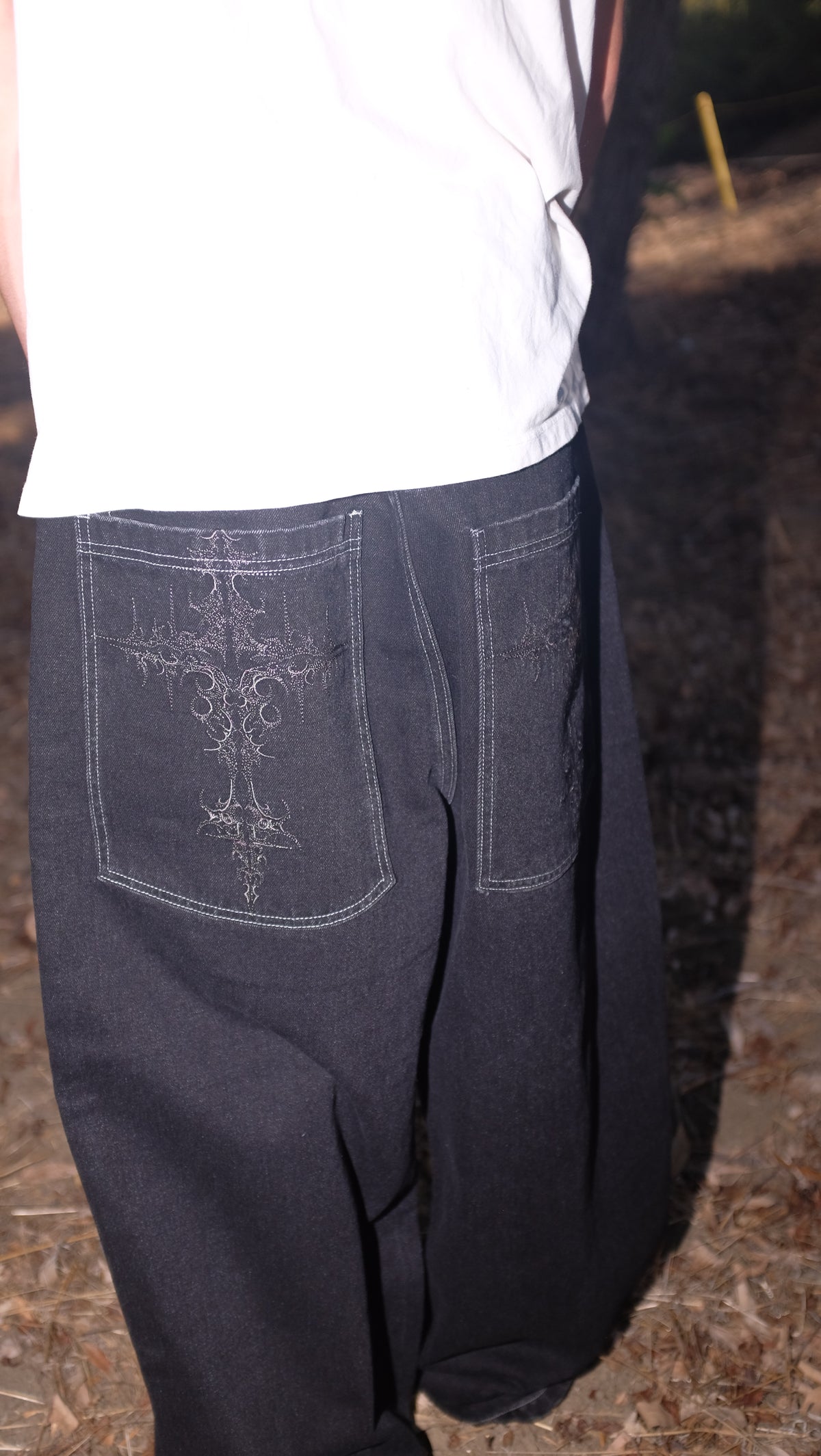 black cross jeans white stitching