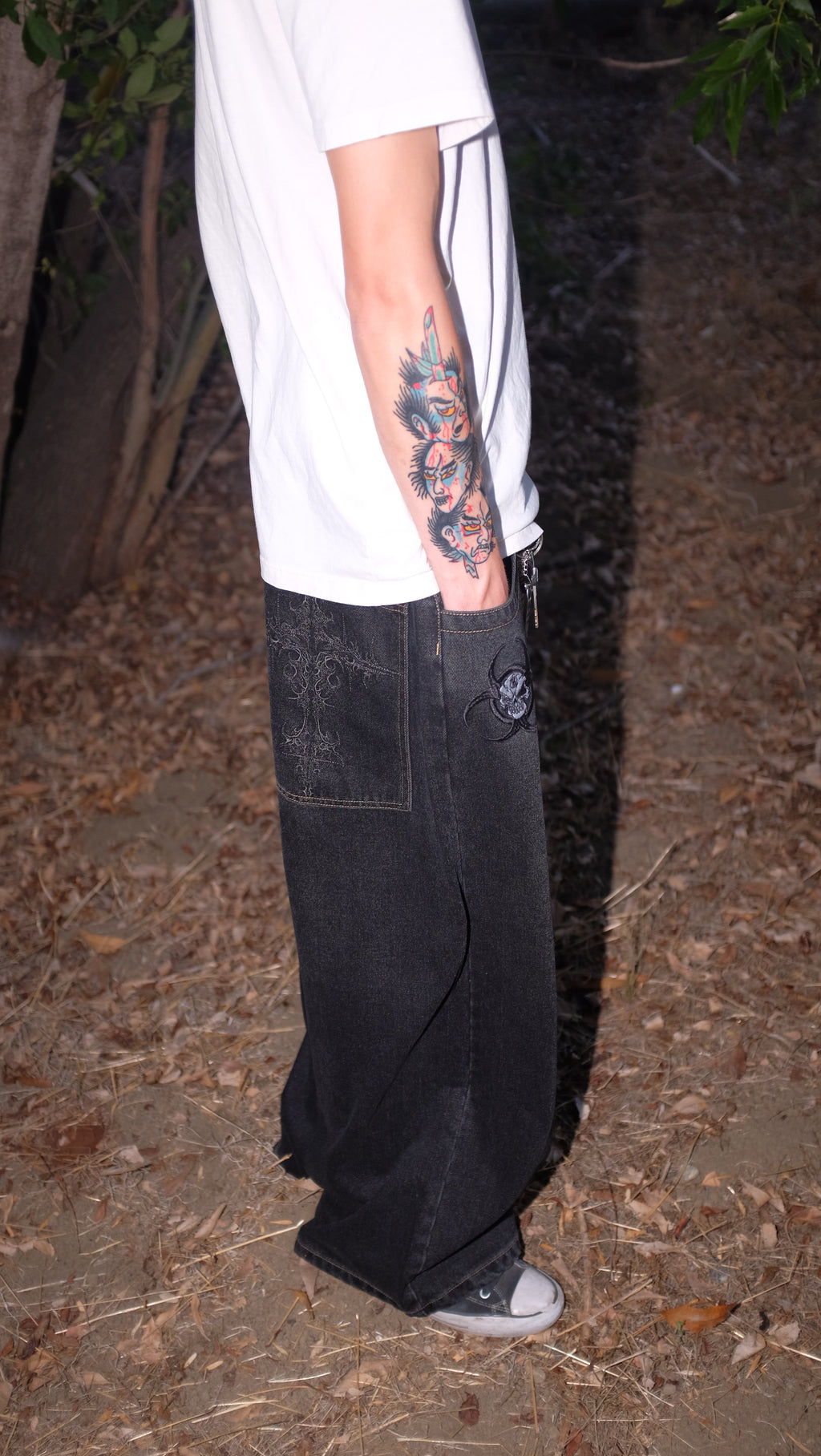 black cross jeans rust stitching