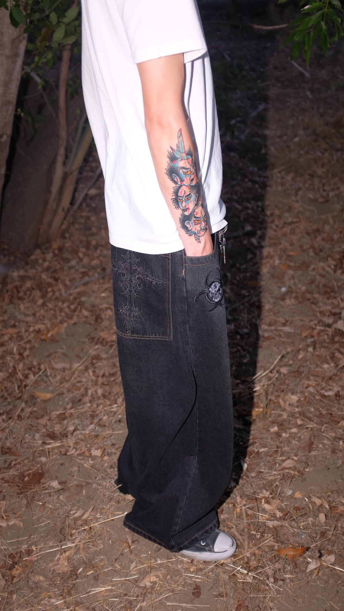 black cross jeans rust stitching